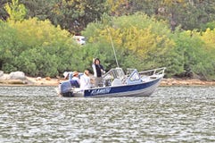 Two Downrigger Fishing Rods And Reels Stock Photo - Image of handle 