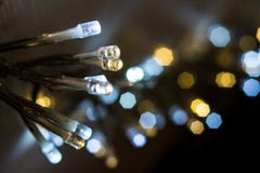 DOWODZENI światła, żarówki z bokeh tłem obraz royalty free DOWODZENI światła, żarówki z bokeh tłem obraz royalty free