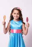 Doçura deliciosa Bailarina pequena Pirulitos coloridos fotografia de stock Doçura deliciosa Bailarina pequena Pirulitos coloridos fotografia de stock