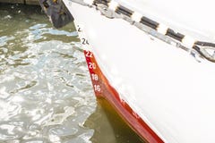 Draft marks on a ship`s bow, waterline stock image Draft marks on a ship`s bow, waterline stock image