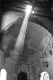 Dramatic beam of light is falling into the church of nativity in stock photo Dramatic beam of light is falling into the church of nativity in stock photo