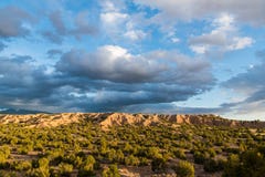 Dramatic sky and clouds over the desert landscape along the pilgrimage route to Chimayo, New Mexico royalty free stock photo Dramatic sky and clouds over the desert landscape along the pilgrimage route to Chimayo, New Mexico royalty free stock photo