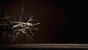 Dramatic Image Of Crown Of Thorns Against Dark Red Background As Symbol Of Death And Resurrection Of Jesus Christ Stock Photos