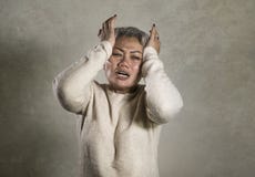 Dramatic portrait of attractive sad and depressed middle aged Asian woman crying helpless suffering depression problem and anxiety stock photo Dramatic portrait of attractive sad and depressed middle aged Asian woman crying helpless suffering depression problem and anxiety stock photo