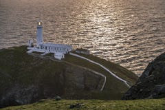 Dramatic sky above the historic South Stack Lighthouse - Isle of Anglesey North wales UK Royalty Free Stock Photo Dramatic sky above the historic South Stack Lighthouse - Isle of Anglesey North wales UK Royalty Free Stock Photo