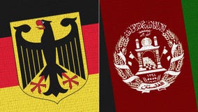 Drapeau de l'Allemagne et de l'Afghanistan images stock Drapeau de l'Allemagne et de l'Afghanistan images stock