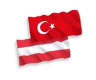 Drapeaux de la Turquie et de l'Autriche sur un fond blanc illustration stock Drapeaux de la Turquie et de l'Autriche sur un fond blanc illustration stock