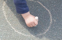 draws-asphalt-chalk-child-hand-s-draw-pavement-94611342.jpg