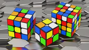 Drei Rubiks-Würfel lizenzfreies stockfoto Drei Rubiks-Würfel lizenzfreies stockfoto