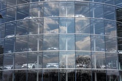 Plug-in hybrid Volkswagen e-Golf electric cars stands behind glass in the Glaserne Manufaktur - Transparent Factory, Dresden