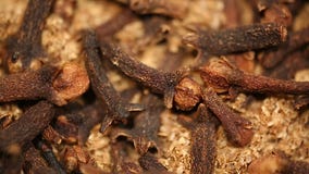 Dried cloves used in medicine and aromatherapy, flavorful spice for dishes