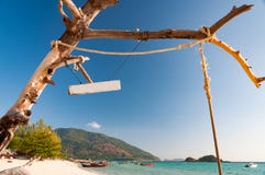 Dried Dead Tree With Rope And A Blank Signage In Front Of A Beac Royalty Free Stock Images Dried Dead Tree With Rope And A Blank Signage In Front Of A Beac Royalty Free Stock Images