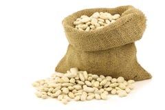 Dried white beans in a burlap bag