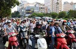 Driver vietnamiti del motorino Fotografie Stock Libere da Diritti Driver vietnamiti del motorino Fotografie Stock Libere da Diritti