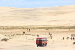 Driving By Bus Into Sand Dune Landscape Stock Photography Driving By Bus Into Sand Dune Landscape Stock Photography