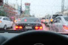 Driving On A Rainy In A City Royalty Free Stock Image