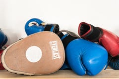 Drohobych, Ukraine - March 03, 2018: Everlast focus punch pad and boxing gloves, for editorial use stock photos Drohobych, Ukraine - March 03, 2018: Everlast focus punch pad and boxing gloves, for editorial use stock photos