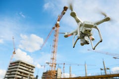Drone over construction site. video surveillance or industrial inspection royalty free stock image Drone over construction site. video surveillance or industrial inspection royalty free stock image