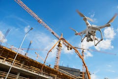 Drone over construction site. video surveillance or industrial inspection royalty free stock photography Drone over construction site. video surveillance or industrial inspection royalty free stock photography