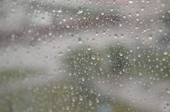 Drops of rain on the window, rainy day Stock Images Drops of rain on the window, rainy day Stock Images