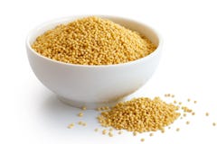Dry millet in white ceramic bowl. royalty free stock photo Dry millet in white ceramic bowl. royalty free stock photo