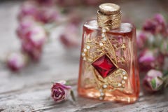 Dry Tea Roses And Vintage Perfume Bottle On The Old Wood Royalty Free Stock Photo Dry Tea Roses And Vintage Perfume Bottle On The Old Wood Royalty Free Stock Photo