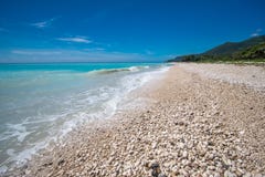Dröm- stenig strand nära Paraiso, Barahona halvö i Dominikanska republiken Arkivbild Dröm- stenig strand nära Paraiso, Barahona halvö i Dominikanska republiken Arkivbild