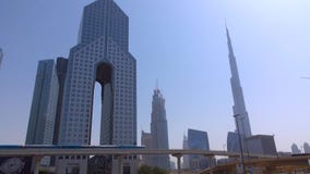 DUBAI, UNITED ARAB EMIRATES - CIRCA DECEMBER 2018 - Burj Khalifa, tallest building in the world, standing over Sheikh Zayed Road d royalty free stock photos DUBAI, UNITED ARAB EMIRATES - CIRCA DECEMBER 2018 - Burj Khalifa, tallest building in the world, standing over Sheikh Zayed Road d royalty free stock photos