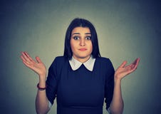 Dumb looking woman arms out shrugs shoulders I don't know royalty free stock photos Dumb looking woman arms out shrugs shoulders I don't know royalty free stock photos