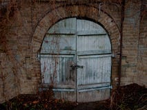 Dungeon, pantry, dungeon, part of the castle, old door, big castle, old-fashioned passage, magic, mystery. royalty free stock photo Dungeon, pantry, dungeon, part of the castle, old door, big castle, old-fashioned passage, magic, mystery. royalty free stock photo
