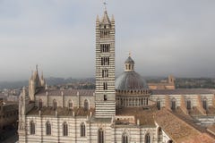 Duomo di Siena and bell tower. View from facciatone Tuscany. Italy. stock photo Duomo di Siena and bell tower. View from facciatone Tuscany. Italy. stock photo
