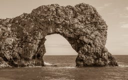Durdle-Tür, Jura- Küste West- Lulworth, Dorset, Süd-England, Sepia lizenzfreies stockfoto Durdle-Tür, Jura- Küste West- Lulworth, Dorset, Süd-England, Sepia lizenzfreies stockfoto