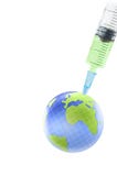 Earth Globe And Syringe Royalty Free Stock Photography