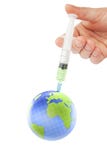 Earth Globe And Syringe In Human Hand Royalty Free Stock Photography