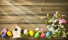 Easter background with colorful eggs and spring flowers stock images Easter background with colorful eggs and spring flowers stock images