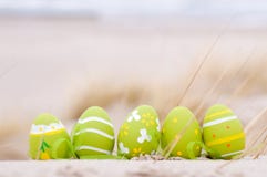 Easter Decorated Eggs On Sand Royalty Free Stock Photos
