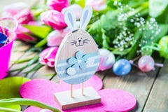 Easter eggs and tulips on wooden planks with German text Happy Easter. stock images Easter eggs and tulips on wooden planks with German text Happy Easter. stock images