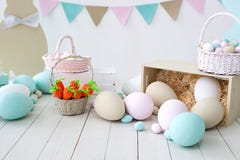 Easter! Many colorful Easter eggs with bunnies and baskets! Easter decoration of the room, children`s room for games. Basket with royalty free stock images Easter! Many colorful Easter eggs with bunnies and baskets! Easter decoration of the room, children`s room for games. Basket with royalty free stock images