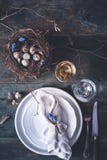 Easter Table Setting With Bird Nest And Tableware Royalty Free Stock Photography