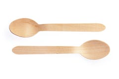 Eco-friendly materials. Wooden, disposable spoon on a white background royalty free stock images Eco-friendly materials. Wooden, disposable spoon on a white background royalty free stock images