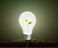 Ecology light bulb concept, realistic light bulb growing on soil with yellow flower inside, eco energy concept, Royalty Free Stock Photos Ecology light bulb concept, realistic light bulb growing on soil with yellow flower inside, eco energy concept, Royalty Free Stock Photos