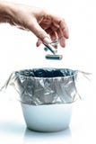 Ecology recycling concept, Do not litter sign, few used batteries in hand drop them in garbage bin, alkaline batteries ban on dis royalty free stock photos Ecology recycling concept, Do not litter sign, few used batteries in hand drop them in garbage bin, alkaline batteries ban on dis royalty free stock photos