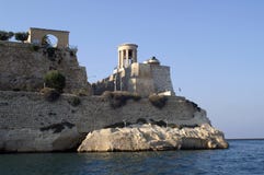 Fortress with a tower on the beach Stock Photo Fortress with a tower on the beach Stock Photo