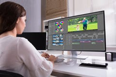 Editor Editing Video On Computer