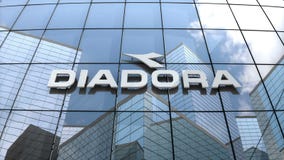 Editorial, Diadora logo on glass building.