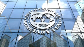 Editorial, IMF logo on glass building.
