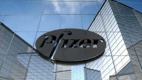 Editorial Pfizer logo on glass building.
