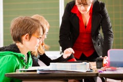 Education - Pupils and teacher learning at school royalty free stock images Education - Pupils and teacher learning at school royalty free stock images