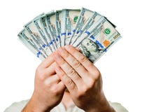 Een mens houdt geld in de handen van een ventilator, dollarsclose-up op een witte achtergrond royalty-vrije stock foto Een mens houdt geld in de handen van een ventilator, dollarsclose-up op een witte achtergrond royalty-vrije stock foto