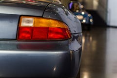 Een rearlight van klassieke die auto, in museum wordt gesitueerd royalty-vrije stock foto Een rearlight van klassieke die auto, in museum wordt gesitueerd royalty-vrije stock foto